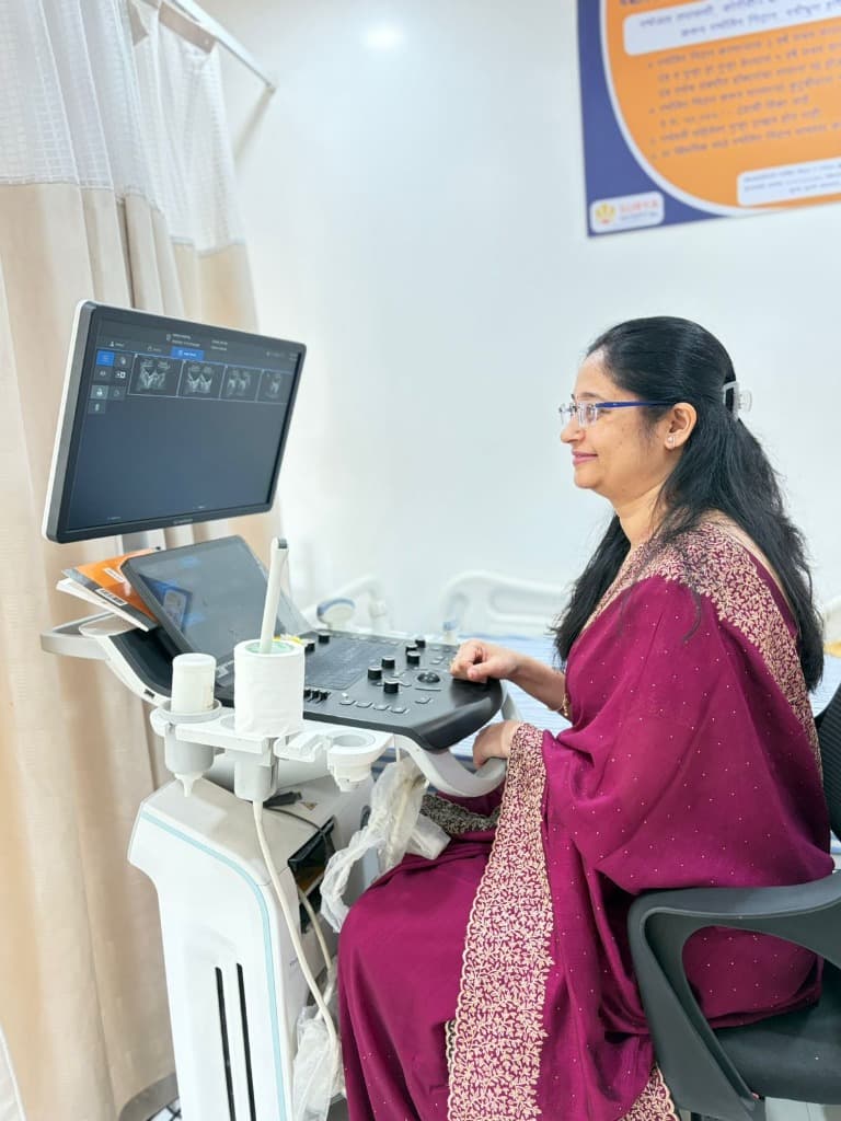 Dr. Sneha Kendre operating sonography equipment